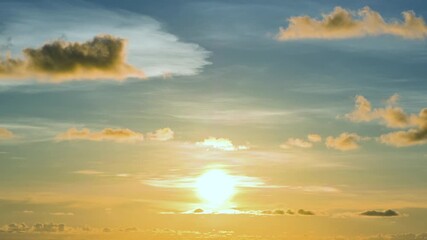 Wall Mural - Sky transform from the first light of dawn to a radiant sunrise, with beautiful clouds painting the morning horizon.