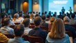 © VistaVisions - Rear view of blurred audience listens lecturer at public company workshop. Corporate professional coaching, academic convention concept