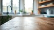 © tinley - A close-up of a wooden table with soft bokeh and minimalist kitchen aesthetics.