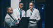 © peopleimages.com - Man, laptop and team with planning in server room with cybersecurity, system or collaboration. Programmer, tech and group with insight for problem solving, maintenance or IT solution at data center