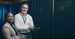 © peopleimages.com - Portrait, tablet and people in server room, cyber security and teamwork with system solution. IT specialist, inspection and employees with tech, data center and hardware upgrade with online safety