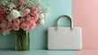 © Beauty - Cream laptop bag near pastel flowers