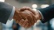 © Johannes - handshake of two business men closing a deal at the office no logos no brands ar 169