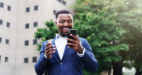 Surprise, business and black man with phone in city for travel, good news and job promotion. Excited, male person and mobile for celebration, company deal and bonus notification of career opportunity