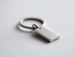 © SolaruS - Minimalist, closeup of a metal keyring on a textured surface. Clean, modern design. Represents organization, identity, security. Ideal for graphic design, product mockups.