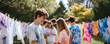 © SolaruS - Youthful group creates tiedye shirts in sunny backyard. Symbolizing community, creativity,  summer fun. Use for youth programs, arts,  crafts, summer camps, or teen lifestyle.