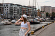 © Андрей Трубицын - girl in a white hat on the background of the city of Gdansk Poland Europe