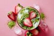 © pixelliebe - Strawberry matcha tea latte with ice cubes and fresh strawberries