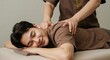 © soojin - Asian man receiving a Thai massage while lying down