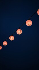Wall Mural - Pastel lantern lights glowing softly in minimalist dark sky