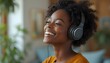 © Вячеслав Краснов - Young woman enjoys listening to music with headphones in a cozy indoor space during daytime Generative AI
