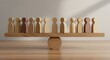 © Aliabbas - Wooden figures balanced on a scale represent diversity and equality in a modern, professional setting symbolizing team cohesion and fair treatment.