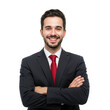© sujon1638 - Smiling businessman with arms crossed wearing a dark suit and red tie looking directly at the viewer isolated on transparent background