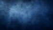 © Husen - Abstract dark blue textured background with subtle cloud-like formations.