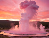 Geyser eruption in a national park, pink clouds in the background at sunset. A natural wallpaper.