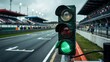 © Design Stock - Close up of a green traffic light at a formula 1 race track ready for the start of the competition