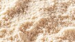 © Entri - Close-up view of light beige powder, texture, background