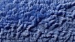 © Azrulla - Close-up view of deep blue, fuzzy fabric texture