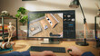 © Gorodenkoff - POV of a Person Sitting Behind a Desk, Using Computer with an Interior Design Software. Anonymous Designer Creating a Living Space Layout, Planning and Organizing a Room for a Client