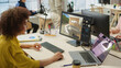 © Gorodenkoff - Multiethnic Interior Designer Working in an Architectural Design and Research Agency. Female Creating a Modern 3D Living Space for a Family, Working on a Living Room Layout, Setting Up a Couch
