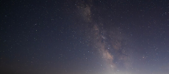 Wall Mural - Beautiful bright Milky Way galaxy on the starry sky.  Night sky astronomical background. 