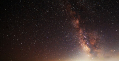 Wall Mural - Beautiful bright Milky Way galaxy on the starry sky.  Night sky astronomical background. 