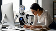 © DAYA-DAKSH - Innovative woman collaborates with advanced robot assistant on modern office project, showcasing future of teamwork and AI integration.