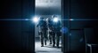 © haryeste - Armed figures in tactical gear burst into a dark room