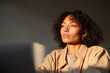 © Levan - ultrabright minimalist workspace scene featuring focused individual at laptop emphasizing productivity