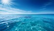 © John - crystal clear blue sea water rippling under soft sunlight creating a sense of serenity and open space perfect for travel and nature designs