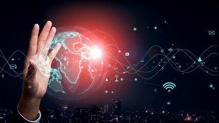 Wall Mural - a person engages with a holographic projection of earth, surrounded by digital elements, symbolizing