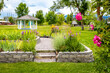 © PhotoSpirit - Missoula Iris Society Snow Garden blooming in summer