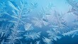 © Kierra - frosty ice crystals against smooth light blue background surface