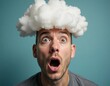© Julija - A man gazes in astonishment with wide eyes and an open mouth, adorned with a fluffy cloud on his head Generative AI
