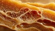 © Asimabbas - Close up of natural beeswax texture in golden light showing warm organic surface patterns ideal for eco product mockups craft visuals or sustainable packaging designs