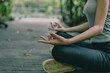 © S photographer - A person practicing meditation outdoors, surrounded by nature, promoting peace and mindfulness in a tranquil setting.