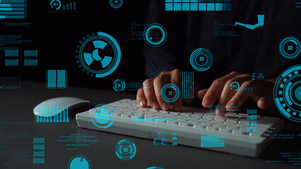 Wall Mural - hands interacting with a keyboard in a high-tech environment, surrounded by blue graphical elements 