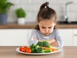 © Vivid_Vision - Little girl refusing to eat vegetables at home