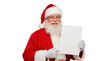 © Jomizu - Santa Claus Holding Christmas Letter Isolated on transparent png.
