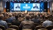 © VistaVisions - Rear view of Audience listening Speakers on the stage in the conference hall or seminar meeting, business and education about investment concept