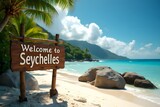 Welcome to Seychelles – beachside bamboo sign on Anse Source d’Argent with granite boulders, cinematic 4K.
