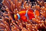 Vibrant orange fish with white stripes playfully swims among psychedelic anemone tentacles, macro, exotic