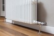 © Pavel - Modern radiator installed in a contemporary home interior providing efficient central heating during the colder months