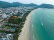 

aerial panorama view green sea at Patong beach Phuket Thailand.
Patong Beach, Phuket  used to be one of the top tourist destinations in the world. 
white sand beach green sea smoot waves background