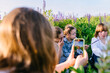 © Iryna - Group portrait of children with Down syndrome painting outdoors in meadow