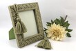 © MDJulfikar - Ornate vintage photo frame with tassels and a decorative flower