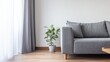 © buter - Modern interior with gray sofa and clean lines, perfect for design inspiration, real estate marketing, or contemporary living concepts.