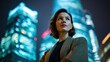 © CStock - A confident woman stands in front of modern skyscrapers at night, embodying empowerment and urban lifestyle.