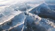 © Kitta Studio - Cracks Forming on Magical Frozen Crystal Surface of Ice