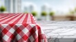© rinz - Checkered tablecloth on marble surface